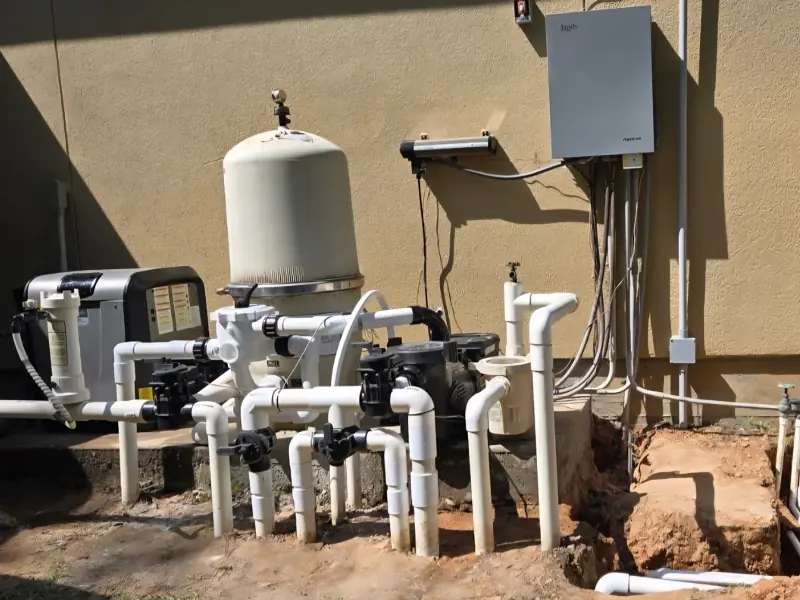 Pool equipment pad with salt system and filter serviced by Redzone Pools in Greater Houston